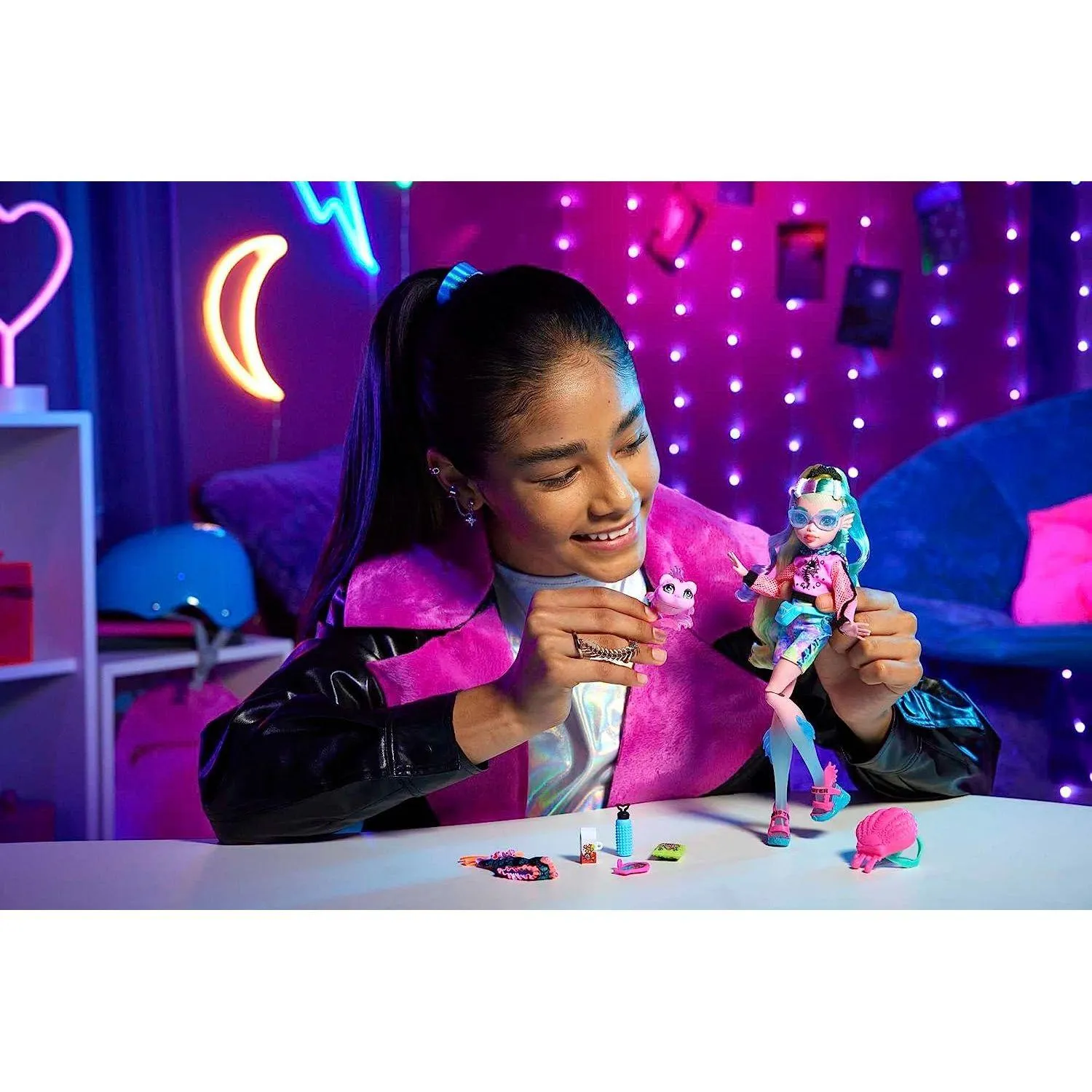 Mattel Monster High Lagoona Blue Fashion Doll with Colorful Streaked Hair, Signature Look, Accessories & Pet Piranha